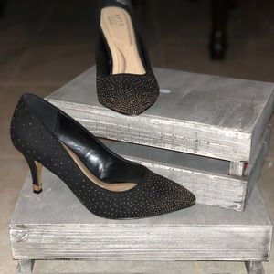 Gold embellished black pumps